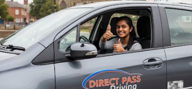 Student celebrating passing their driving test