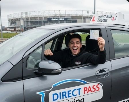 Student holding pass certificate outside test centre